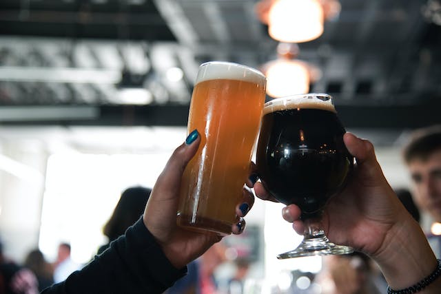 A couple raised the beer glasses